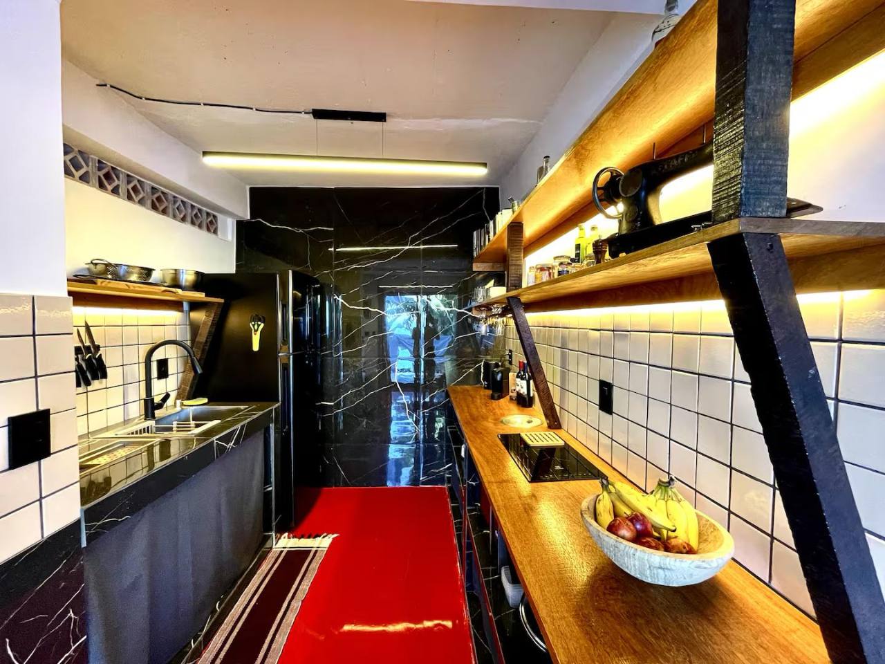 Cozinha compartilhada totalmente equipada da Casa Papillon.